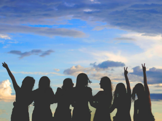 photo of 7 women in silhouette